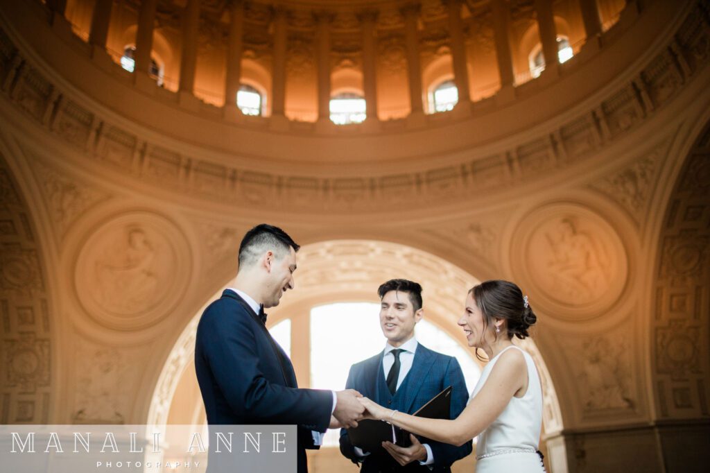 A couple gets married during a private ceremony on the 4th Floor of San Francisco City Hall