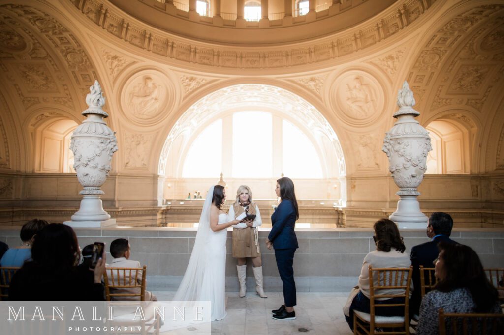 A couple gets married during a Private Ceremony on the 4th Floor of San Francisco City Hall
