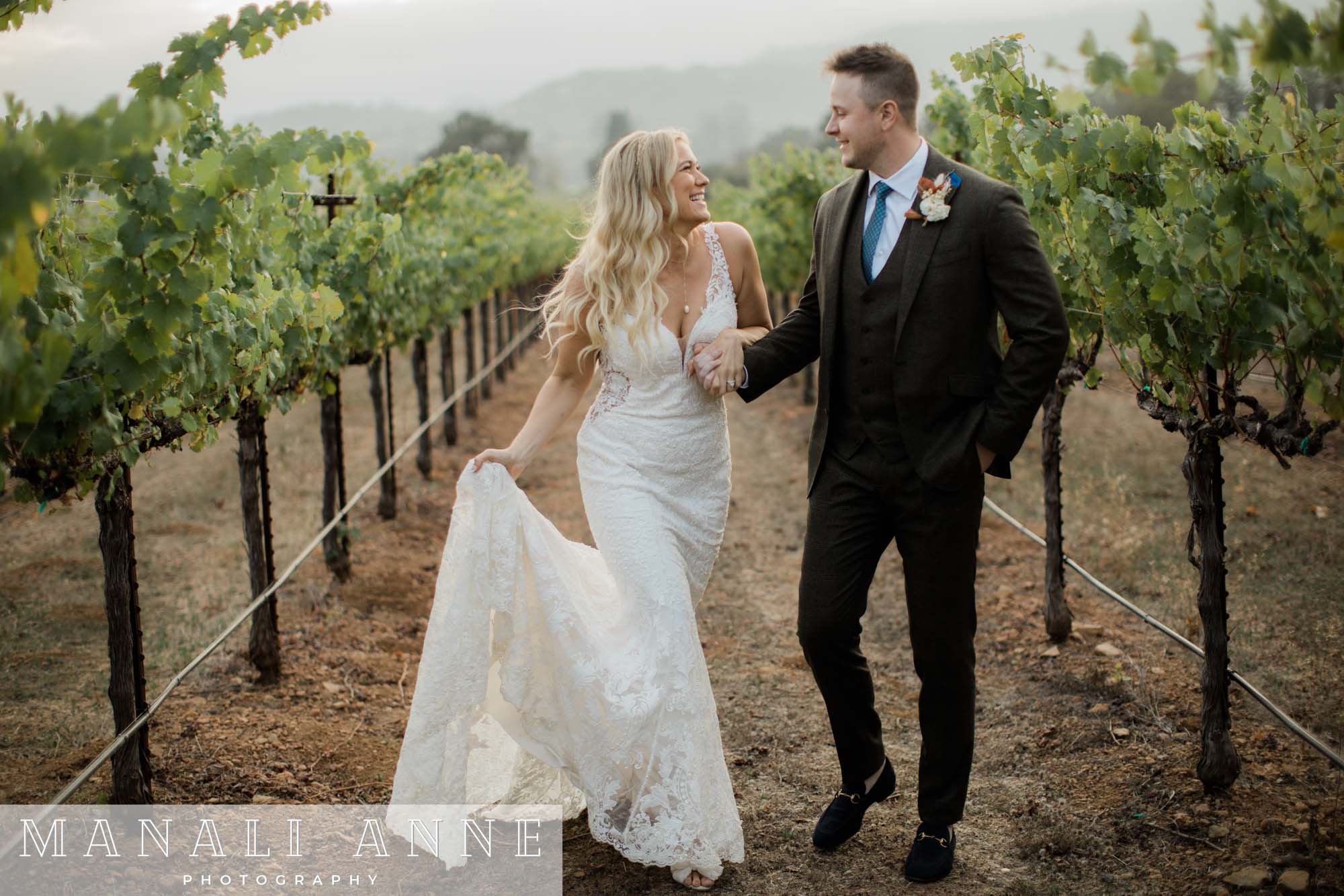 Wedding couple at Chateau St. Jean vineyards