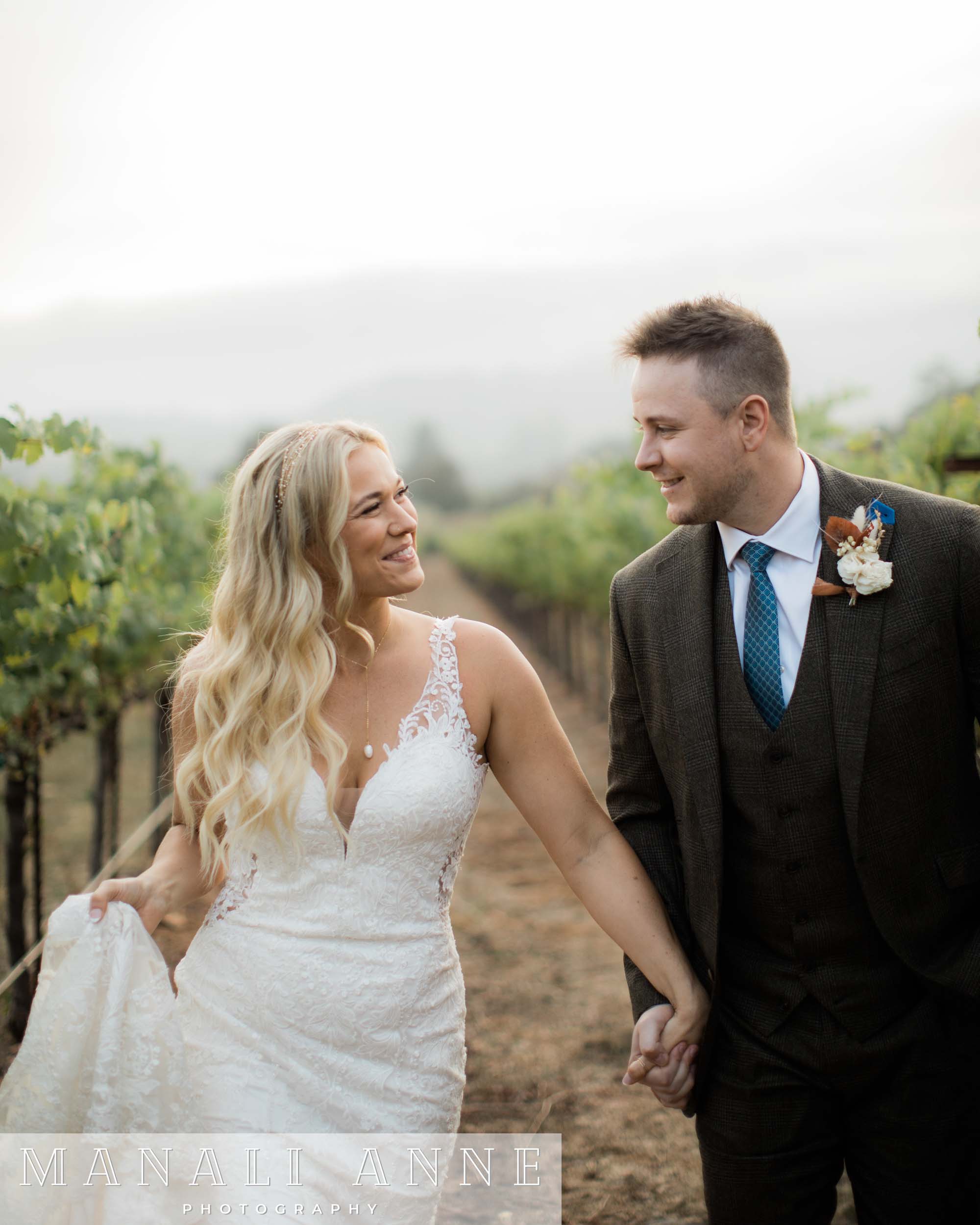 Wedding couple at Chateau St. Jean vineyards